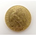 A French Republic 20 franc gold coin, 1910, approx. 6.45g Please Note - we do not make reference