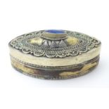 A silver plate box of lozenge form, set with lapis lazuli stone to top. Approx. 2 1/2" wide Please