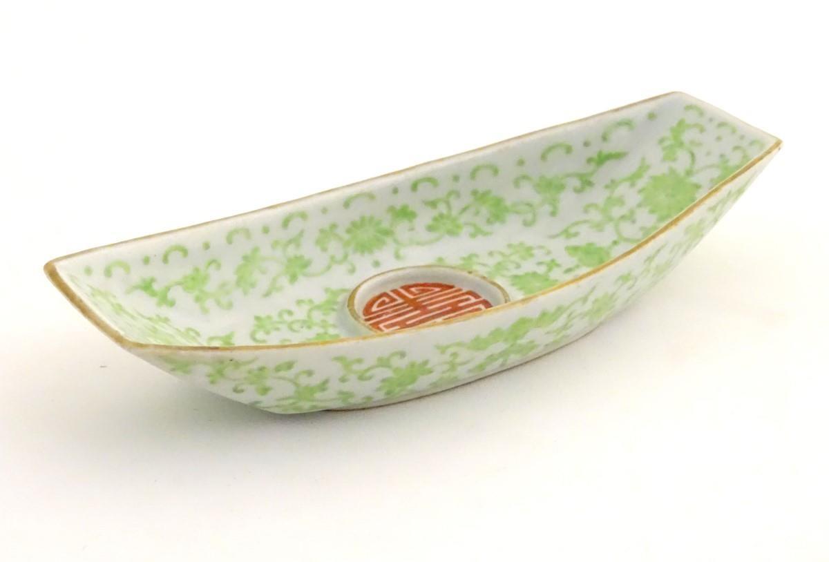 A Chinese standish / inkstand dish of oblong form, decorated with scrolling flowers and foliage