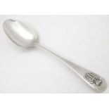 A Victorian silver Old English pattern spoon the handle decorated with Royal Navy Insignia,