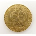 A French Republic 20 franc gold coin, 1907, approx. 6.45g Please Note - we do not make reference