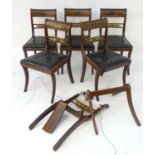 A set of five (+1) Regency mahogany dining chairs with brass inlaid frames, gilt brass mid rails and