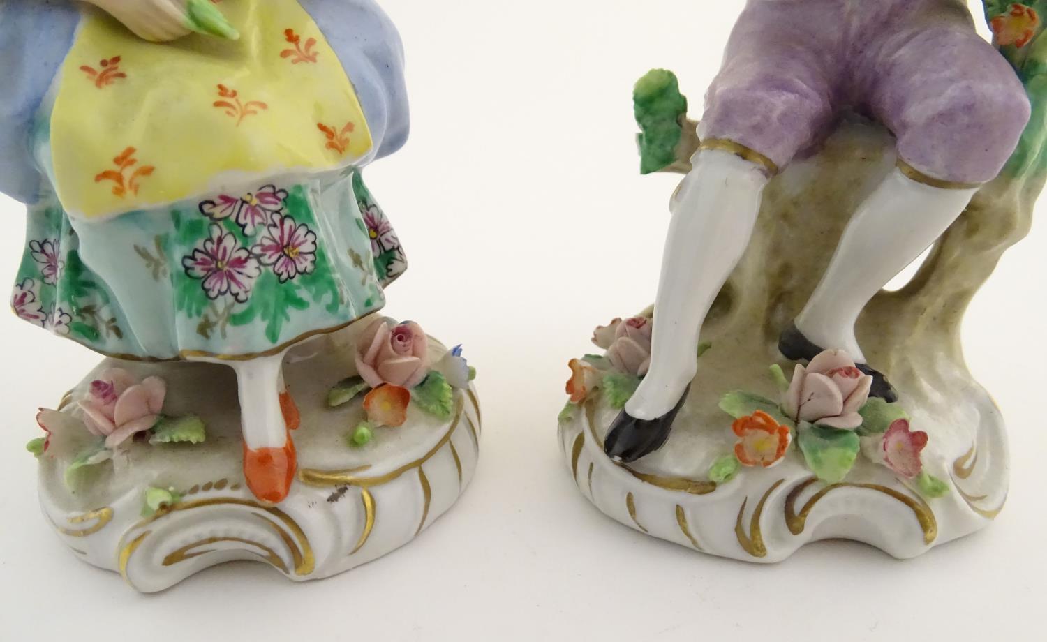 A pair of German Sitzendorf porcelain florist figures, a gentleman and lady, each seated on a - Image 18 of 20