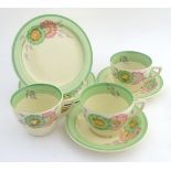 A quantity of teawares with ribbed detailing and floral decoration, to include 3 tea cup, 2