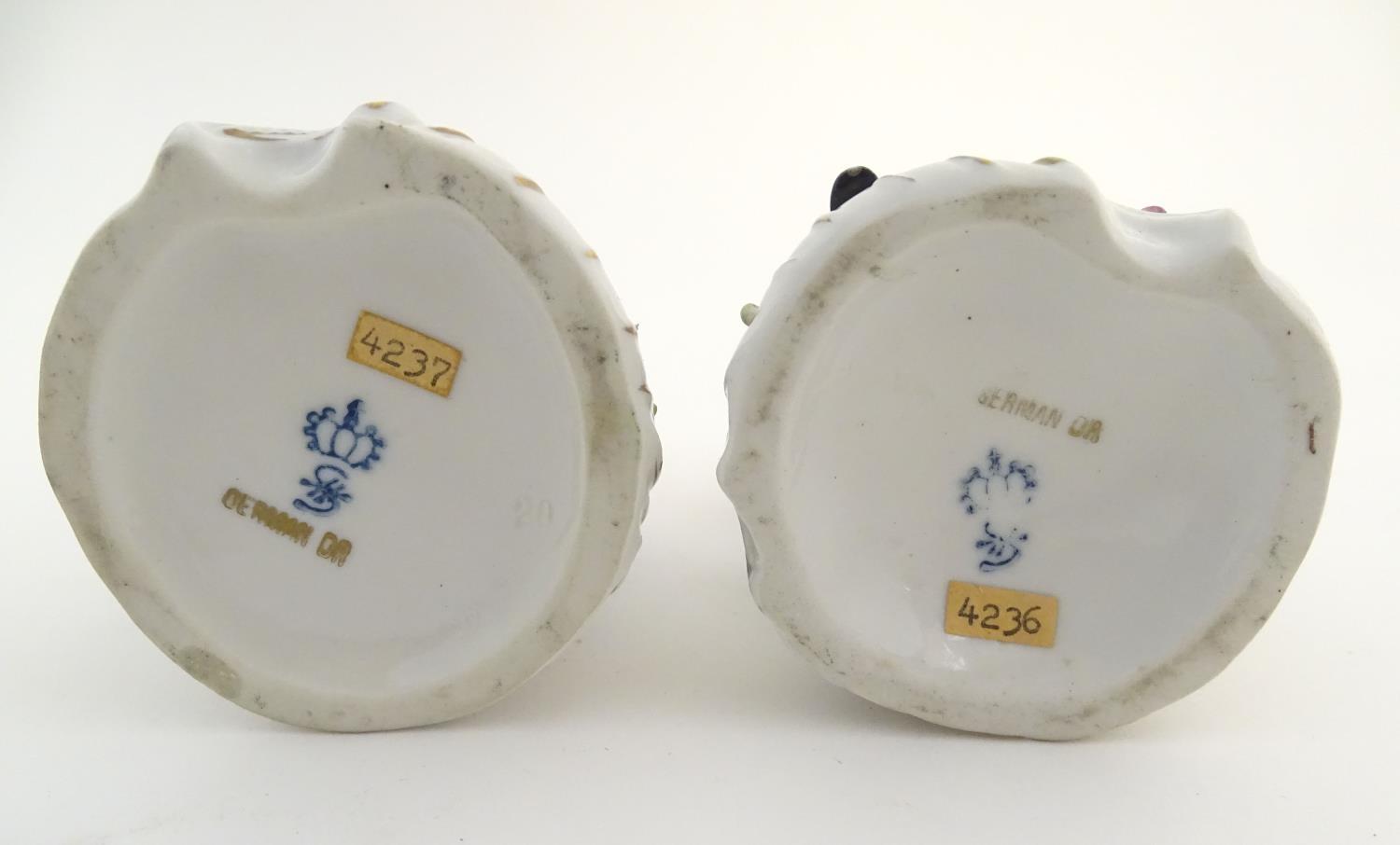 A pair of German Sitzendorf porcelain florist figures, a gentleman and lady, each seated on a - Image 3 of 20