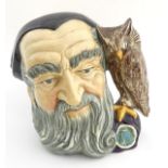 A Royal Doulton Toby character jug, formed as Merlin, model number D 6529. Marked under. Approx.