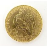 A French Republic 20 franc gold coin, 1910, approx. 6.45g Please Note - we do not make reference