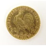 A French Republic 20 franc gold coin, 1905, approx. 6.45g Please Note - we do not make reference