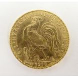 A French Republic 20 franc gold coin, 1910, approx. 6.45g Please Note - we do not make reference