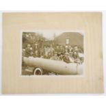 An early 20thC sepia photograph depicting a Fiat charabanc open topped coach / bus with