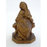 An early 20thC carved wooden sculpture depicting the Madonna and child by Katharina Kaslatter.