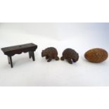 A quantity of assorted early 20thC carved wooden items to include two Black Forest style bears