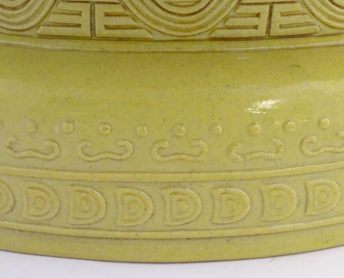 A Chinese yellow ground lidded pot raised on a foot, with twin handles formed as stylised elephant - Image 4 of 32
