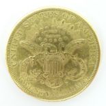 An 1882 gold twenty dollar Liberty Head coin. Approx. weight 33.50g Please Note - we do not make