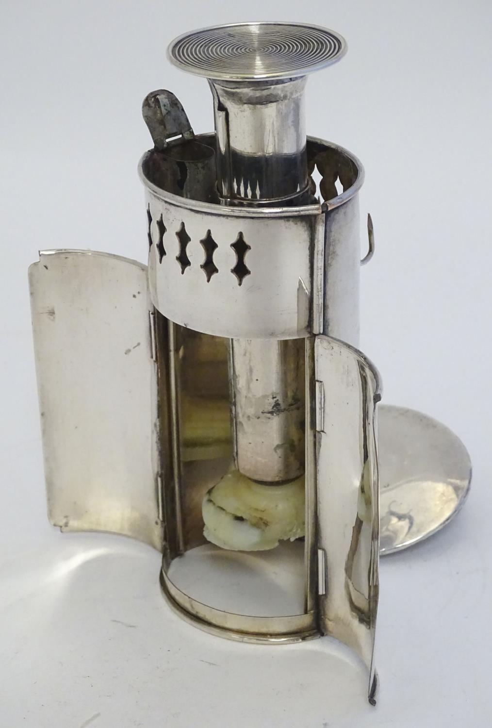A 19thC silver plate travelling candle lantern with pierced decoration and double doors. Contained - Image 15 of 23