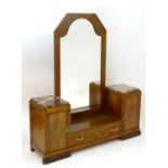 An early / mid 20thC Art Deco dressing table, having two marble topped cabinets above panelled