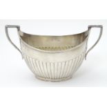 A Victorian silver twin handled sucrier / sugar bowl. Hallmark Birmingham 1898 maker Elkington &
