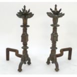 Garden & Architectural: a pair of 19thC cast iron and bronze fire dogs, the columns supporting