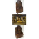 A 19thC mahogany three part bureau bookcase with a rolling cylindrical front opening to show a