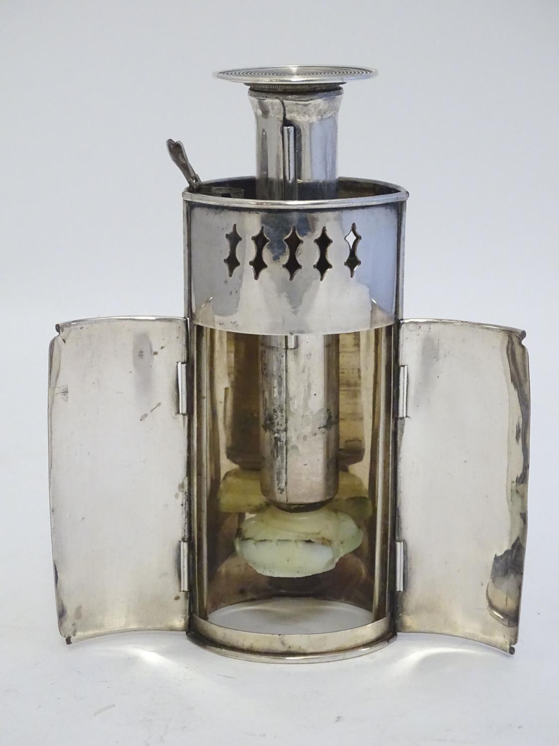 A 19thC silver plate travelling candle lantern with pierced decoration and double doors. Contained - Image 8 of 23