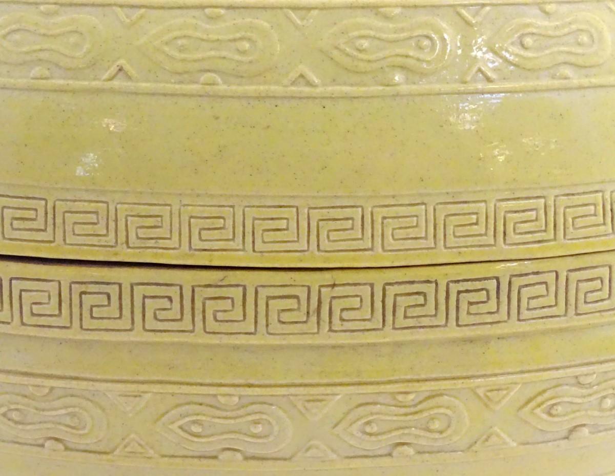 A Chinese yellow ground lidded pot raised on a foot, with twin handles formed as stylised elephant - Image 31 of 32