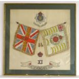 Militaria: a framed embroidered panel, depicting the arms of the Devonshire Regiment (1685-1958),