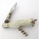 Kitchenalia: a mid-20thC miniature novelty sommelier's tool, combining folding steel corkscrew and