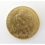 A French Republic 20 franc gold coin, 1907, approx. 6.45g Please Note - we do not make reference