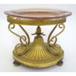 A c.1903 Elkington & Co. gilt metal oval centrepiece stand with scrolling decoration and central