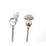 Charles Horner: Two hat pins , one surmounted by tendril detail, the other a grenade . Marked CH