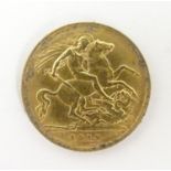 A 1911 gold George V half sovereign coin. Approx. weight 4g Please Note - we do not make reference