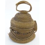 Ethnographic / Native / Tribal : A woven Abelam Yam festival basketry helmet mask of domed form with