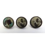 Two Victorian brass buttons depicting a lithographic image of a Jack Russell, together with