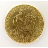 A French Republic 20 franc gold coin, 1910, approx. 6.45g Please Note - we do not make reference