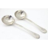 A pair of silver Old English Thread pattern sauce ladles, hallmarked London 1915, maker Spink & Son.