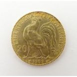 A French Republic 20 franc gold coin, 1909, approx. 6.45g Please Note - we do not make reference