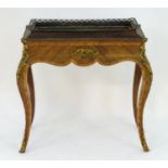 A 19thC kingwood and ormolu mounted jardiniere table with a removable metal lined interior, having
