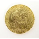 A French Republic 20 franc gold coin, 1910, approx. 6.45g Please Note - we do not make reference