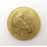A French Republic 20 franc gold coin, 1908, approx. 6.45g Please Note - we do not make reference