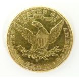 An 1888 gold ten dollar Liberty Head coin. Approx. weight 16.63g Please Note - we do not make