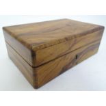 A 20thC desk/dressing table box, of figured walnut construction with mitred edges, the interior
