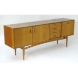 Vintage Retro: a mid-20thC teak sideboard by G-Plan (E Gomme of High Wycombe) comprising cupboard