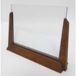 An Art Deco oak picture / photograph frame / stand. Approx. 7" high. Please Note - we do not make