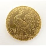 A French Republic 20 franc gold coin, 1911, approx. 6.45g Please Note - we do not make reference