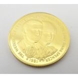 A 1981 gold Isle of Man crown commemorating the wedding of Charles and Diana. Approx. weight 7.87g