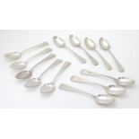 A set of 12 Victorian Scottish silver teaspoons with chased and engraved decoration, hallmarked