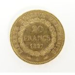 A French Republic 20 franc gold coin, 1897, approx. 6.45g Please Note - we do not make reference