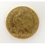 A French Republic 20 franc gold coin, 1904, approx. 6.45g Please Note - we do not make reference