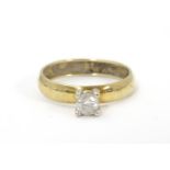 A 9ct gold ring set with diamond solitaire . The solitaire approx 1/8", the ring size approx size