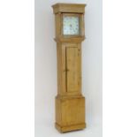 A Victorian pine cased 30 hour long case clock with painted dial, signed ' R . Freeman, Great